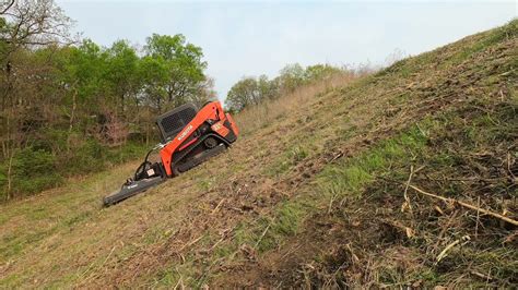 best skid steer on hills|slopes mowing with skids.